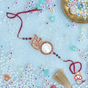 Radiant Om Ganesh Rakhi – Gold-Plated with Central Jewel