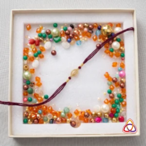 Amaryllis Burgundy Rakhi & Celebration Stone Curated Set