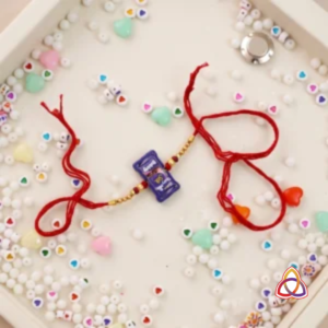Sweet Bubbly Delight: Miniature Cadbury Silk Rakhi