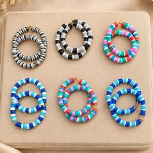 Two pairs utilize a bright, multi-colored mix including red, pink, green, teal, and blue beads.