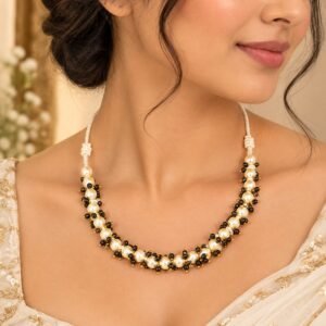 Beaded Necklace Featuring A Central  Creamy White Pearls